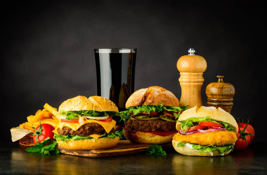 Best Burger Combo Deals in Clayton – Where Flavour Meets Value 2 different burgers with cola fast food 2024 09 17 13 46 15 utc