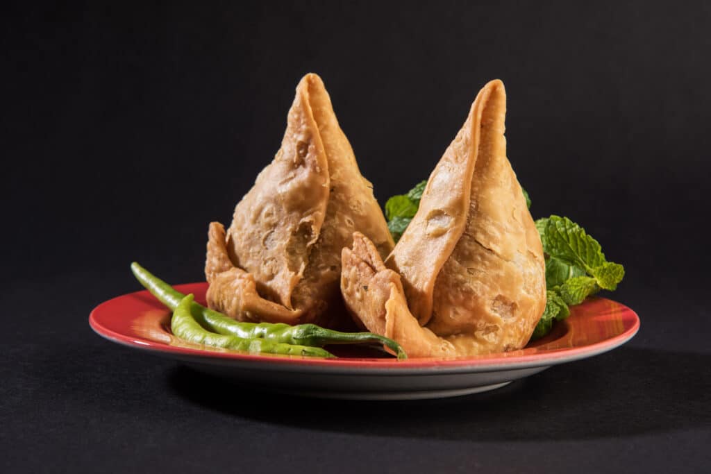 The Best Indian Samosa in Clayton: Why Locals Can’t Stop Raving About Tiffin Box 2 veg samosa is a crispy and spicy indian triangle 2025 01 16 12 59 32 utc